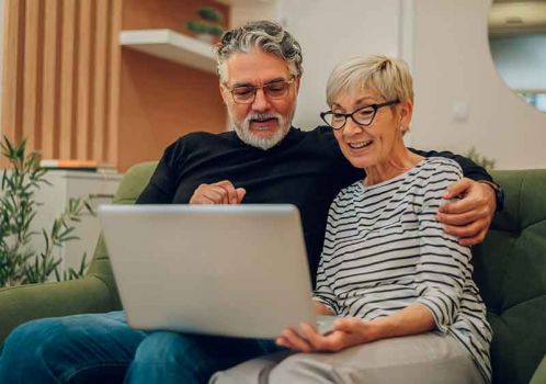 husband and wife reading care advice